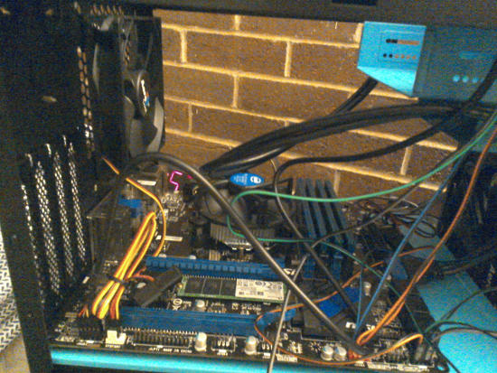 Wires being attached to the motherboard.